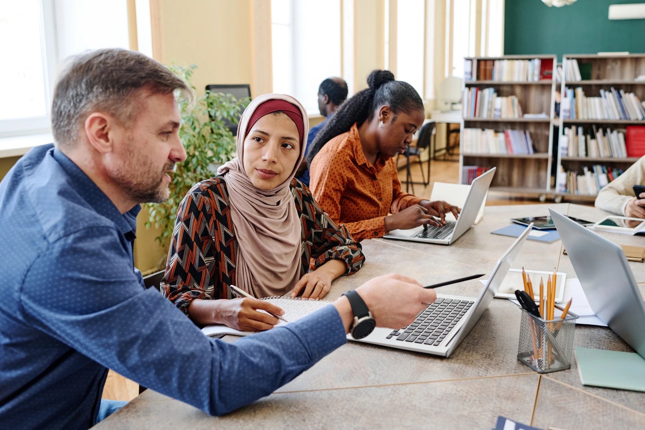 diverse tech professionals learning online