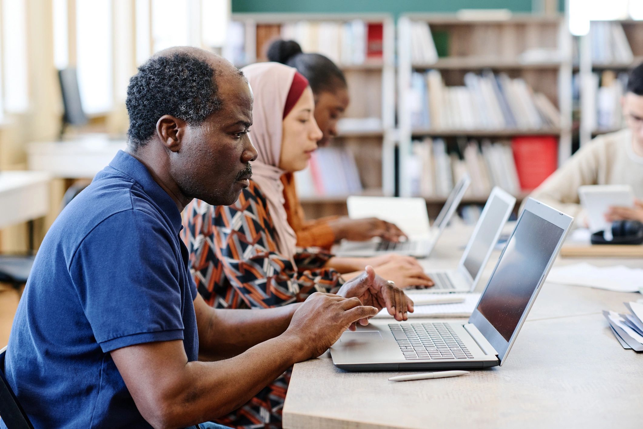 diverse tech professionals learning online